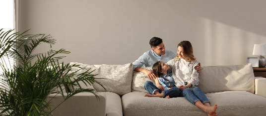 Couple talking in living room