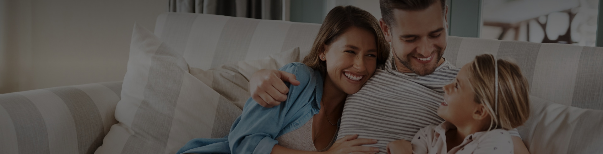 Family staying together in living room