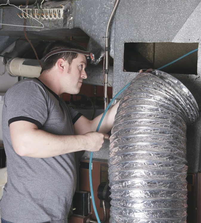 Man doing installation of pipe building