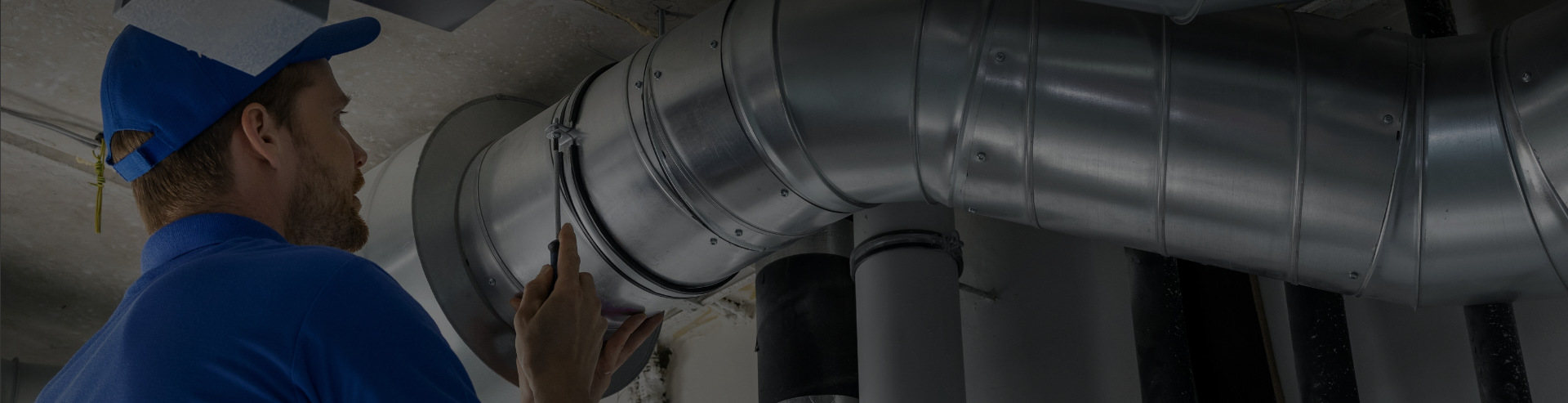 Man doing installation of pipe