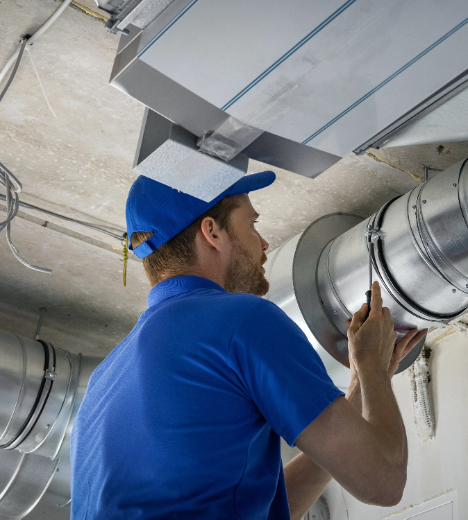 Man installing pipe