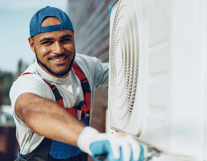 Young man smiling and doing installation