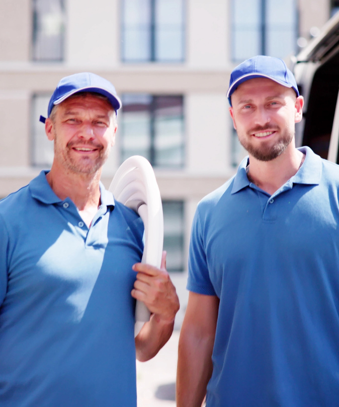 Two men working together humidifier installation